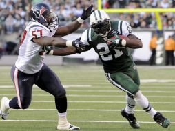 LaDanian Tomlinson (der) no quiso jugar con los Vikingos de Minnesota por su familia y porque no sabía quien era el quarterback. EFE  /