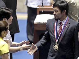 Manny Pacquiao fue condecorado en su país, Filipinas, a su regreso tras la pelea ante Antonio Margarito. EFE  /