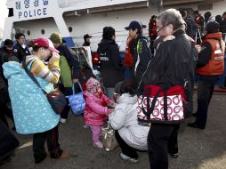 Residentes de la isla Yeonpyeong fueron desalojados después del ataque norcoreano. EFE  /