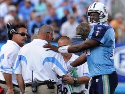 Jeff Fisher (izq.) es el entrenador con más temporadas en un sólo equipo de la NFL, con 16. AP  /