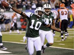 Santonio Holmes celebrando la victoria de los Jets de Nueva York. AP  /
