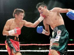 El japonés Hozumi Hasegawa venció al mexicano Juan Carlos Burgos por decisión unánime. AFP  /