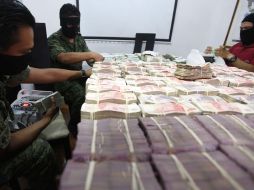 Dinero incautado en un operativo. Procuradores señalan que es necesario avanzar en el estudio del fenómeno delictivo. ARCHIVO  /
