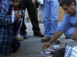 Los cuerpos se encontraban con los rostros de las víctimas tapados. ARCHIVO  /