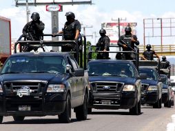 Los elementos de la policía fueron baleados. AP  /
