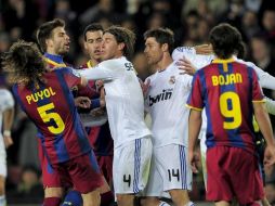 Foto de acción del pleito que se realizó al término del Clásico español. AFP  /