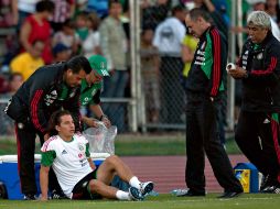 El mediocampista se lesionó jugando un partido con la selección mexicana. MEXSPORT  /