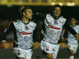 Mauro Gerk y Luis Orozco celebrando el primer gol a favor de Tijuana. MEXSPORT  /