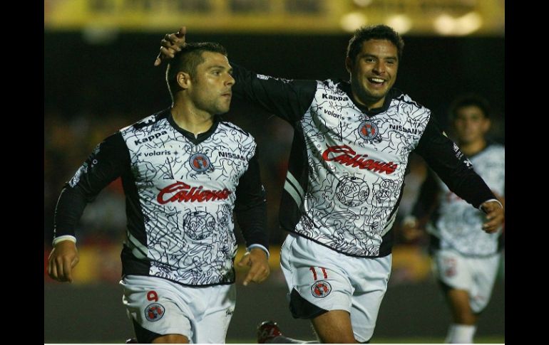 Mauro Gerk y Luis Orozco celebrando el primer gol a favor de Tijuana. MEXSPORT  /