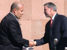 El gobernador Emilio González Márquez (izquierda) acudió al informe del alcalde Enrique Alfaro Ramírez. ESPECIAL  /