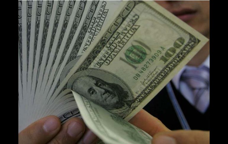 La venta de dólares en las sucursales se ha normalizado, habilitándose cinco mil ventanillas en casas de cambio y bancos. REUTERS  /