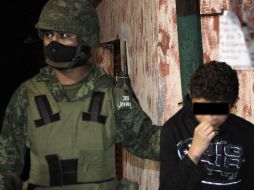 El menor fue detenido por militares. AFP  /