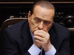 El primer ministro italiano, Silvio Berlusconi, se enfrenta a una moción de confianza en el Parlamento. AFP  /
