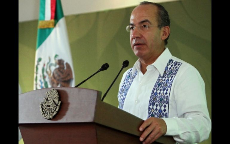 Calderón fungió como líder en algunas reuniones de la Cumbre de Cancún, lo que fue reconocido por Barack Obama. AFP  /