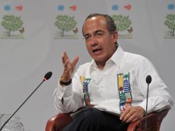 Felipe Calderón agradeció el apoyo brindado al país durante el desarrollo de las conferencias en Cancún. AFP  /