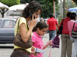 Del total de los ingresos 52 mil 129 MDP fueron generados por el segmento de la telefonía móvil. ARCHIVO  /