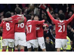Los jugadores del Manchester United celebrando su victoria ante el Arsenal. AP  /