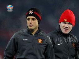 Javier Hernández y Wayne Rooney, durante la práctica del Manchester United. GETTY IMAGES SPORT  /