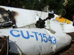 El gobierno de Cuba dijo que un 'congelamiento severo' y errores de la tripulación causaron la caída de un avión el 4 de noviembre. AP  /
