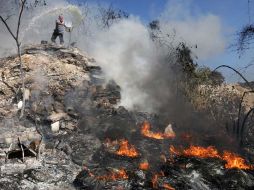 La conflagración ocurrió durante esta tarde en el Bosque El Nixticuil. A. CAMACHO  /