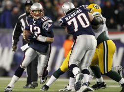 Tom Brady (12) fue clave en los últimos minutos del último cuarto. AP  /