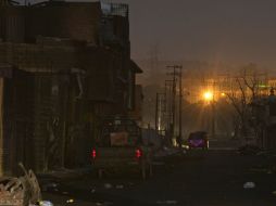 Vista general del  sitio de la explosión del oleoducto de Pemex en Texmelucan. AFP  /