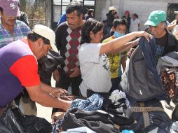 Los niños que se vieron afctados les espera una navidad muy distinta. La gente comienza a recibir ropa y despensas. NTX  /