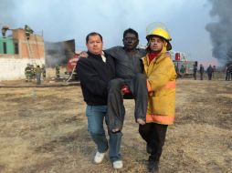 Aspecto de la evacuación de personas en Texmelucan, Puebla, cuando la explosión del domingo que dejó 29 muertos. ARCHIVO  /
