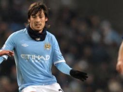 El futbolista español David Silva manifestó que su estancia estos seis meses con el Manchester City ha sido muy amena. AFP  /