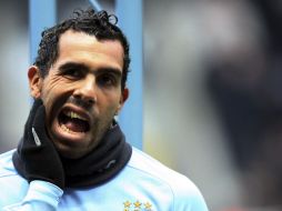 Carlos Tevez llevó al triunfo a los Citizens ante el Newcastle. AP  /