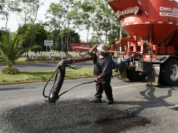 En trabajos de bacheo, Zapopan ha invertido más de 19 millones de pesos durante todo el año. E. BARRERA  /