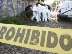 El cadáver envuelto en una cobija se encontró en el poblado de Santa Anita. ARCHIVO  /