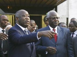 El presidente de Sierra Leona y su homólogo de Costal de Marfil en Abidjan. EFE  /