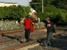 De acuerdo con datos de la CNDH, cada año emigran a Estados Unidos 75 mil hondureños que cruzan territorio mexicano. ARCHIVO  /