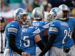 Los jugadores de Leones de Detroit festejando su victoria ante los delfines de Miami de la pasada jornada. AP  /
