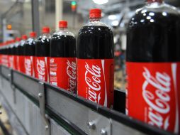 La empresa mexicana compró 75% acciones de la embotelladora ecuatoriana de Coca Cola. AFP  /