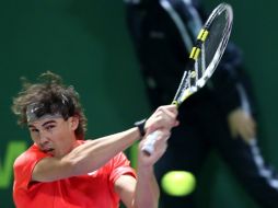 El tenista español Rafael Nadal ha conseguido su primer victoria junto a Marc López en Doha. AFP  /
