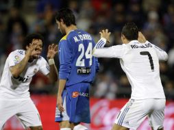 Cristiano Ronaldo anotó dos goles en el partido ante el Getafe. AP  /