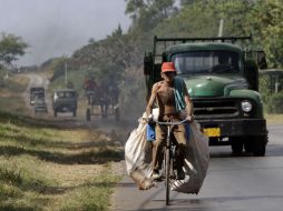 Las charlas buscan promover una migración segura, legal y ordenada  de cubanos hacia EU. AP  /