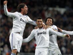 Cristiano Ronaldo brilló en la cancha tras anotar tres de los cuatro goles de la victoria ante el Villarreal. AP  /