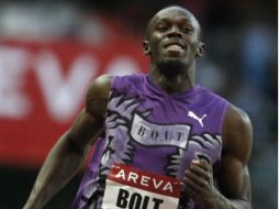 El velocista jamaiquino Usain Bolt asegura que ha superado su lesión y se encuentra en buenas condiciones. AP  /