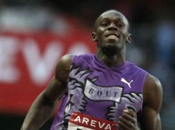 Usain Bolt augura un gran año 2011. AP  /