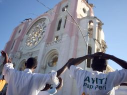 Al cumplirse un año del sismo en Haití, miles de personas participaron en actividades para recordar a las víctimas. AFP  /