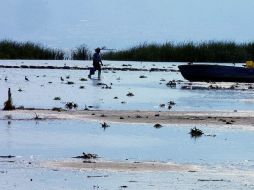 La Conagua informó que parte del líquido que se pierde del lago es por la evaporación, no sólo por el uso humano. ARCHIVO  /