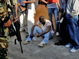 Haitiano detenido por las autoridades. AP  /