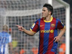 David Villa celebra uno de los goles de la victoria del Barcelona. REUTERS  /