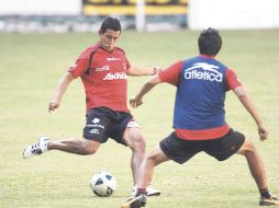 Alfredo Moreno se alista para disparar durante un entrenamiento. MEXSPORT  /