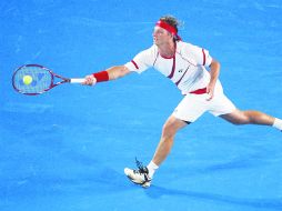 David Nalbandian (foto) como Lleyton Hewitt llevaron al máximo sus capacidades físicas. AP  /