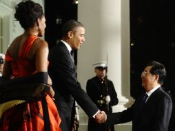 El presidente Barack Obama saluda a su homólogo chino, Hu Jintao. AFP  /