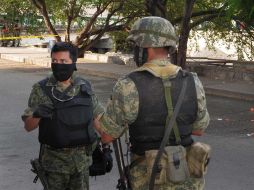 Militares en la escena de un crimen en Acapulco a principios de enero. ARCHIVO  /